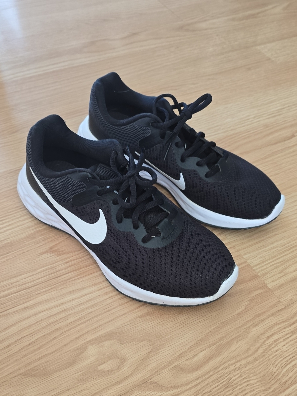 Nike Revolution Black and White Running Sneakers